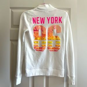 Victoria’s Secret Pink Sweatshirt White w/ NY 86 sequin back. Size XS